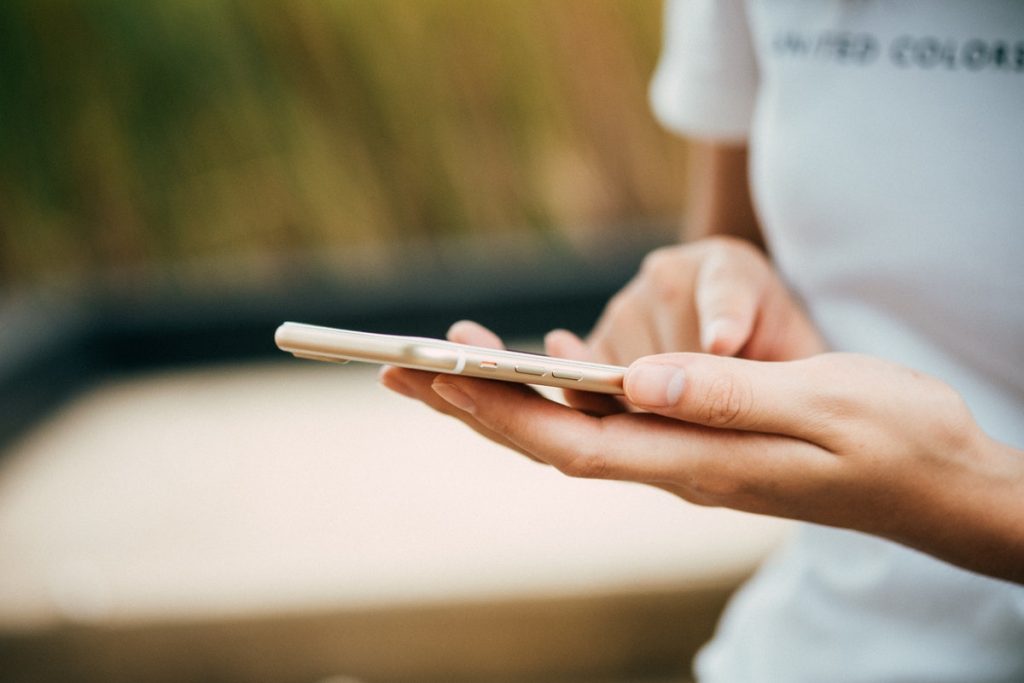 woman using her phone